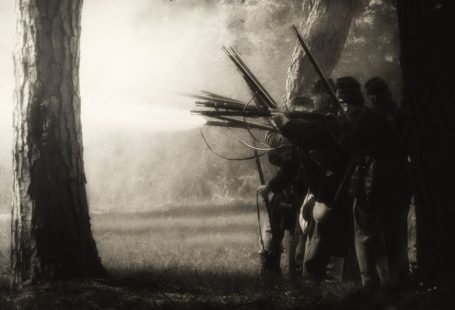 Civil War - people using rifles near trees