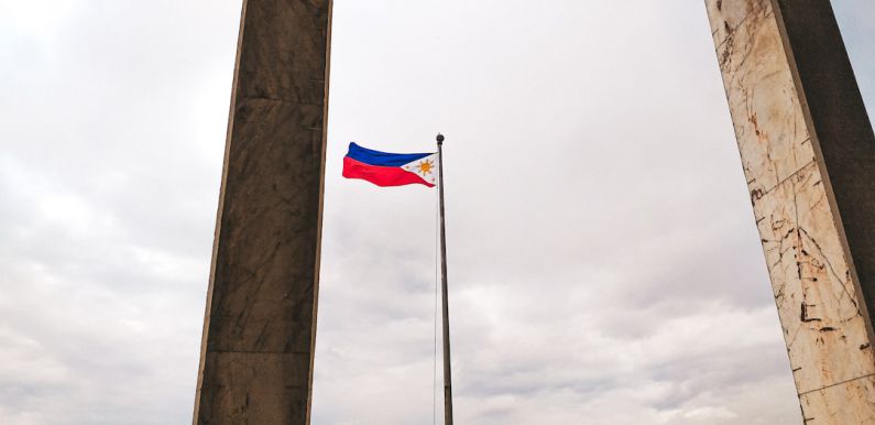 Philippines Flag - rising flag of Philippines during daytime