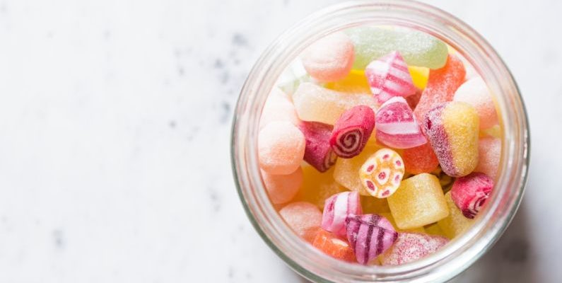 Beet Sugar - assorted-color candies on container
