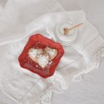 Turbinado Sugar - flat lay photography of heart-shaped cookies on red plate