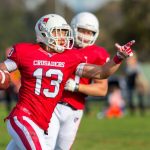 Crusader Helmet - people playing football