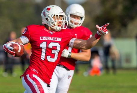 Crusader Helmet - people playing football