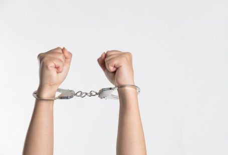 Shackles - person showing handcuff