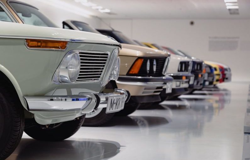 Museum Front - selective focus photography of assorted-color vehicles