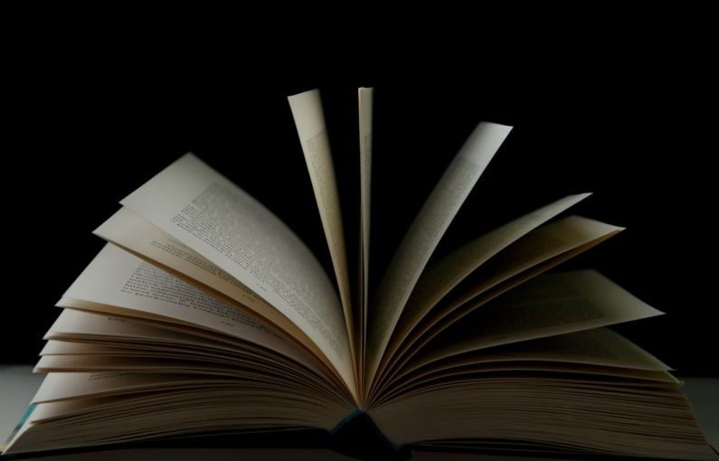 Open Book - white book page with black background