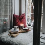 Self-cleaning - photo of gel candle on board beside pillow