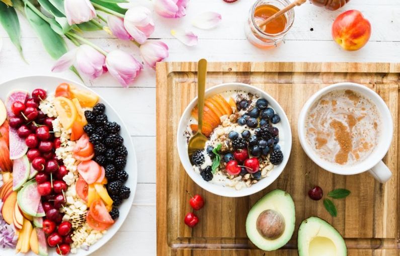 Healthy Breakfast - black and red cherries on white bowl